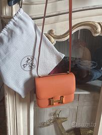borsetta Hermes constance arancione 
