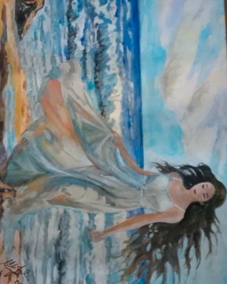 DONNA VELATA AL MARE
