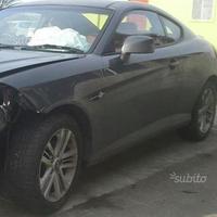 Hyundai Coupè 07 pannelli tastiere specchi portell