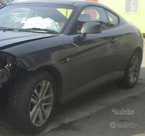 Hyundai Coupè 07 pannelli tastiere specchi portell