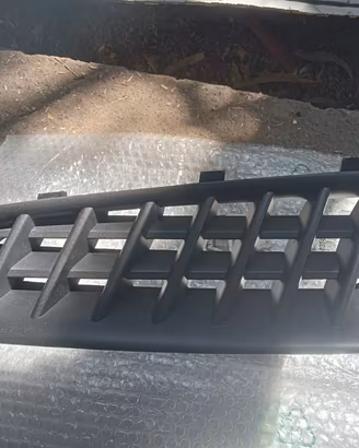 griglia originale paraurti sinistro Renault Clio  