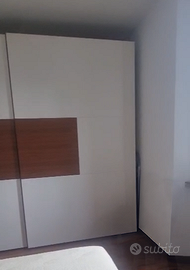 Armadio con ante scorrevoli per camera da letto