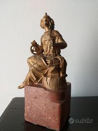 Statuetta antica in bronzo dorato.Fortuna