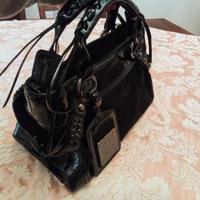Borsa Biasia busta pochette zaino nero pelle vera