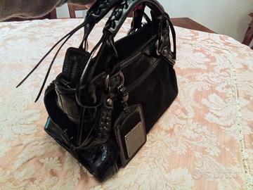 Borsa Biasia busta pochette zaino nero pelle vera