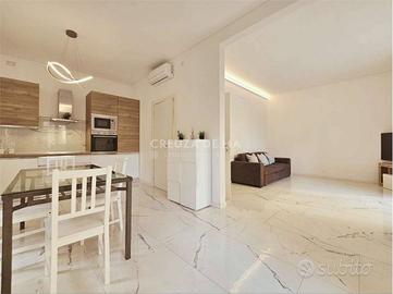 Appartamento di 115 m² con 4 locali e posto auto a
