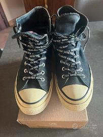 Converse alte da uomo.