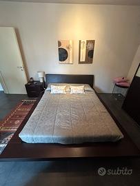 Letto futon legno testiera in pelle