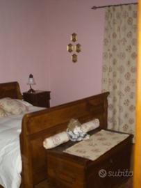 Letto in legno di noce