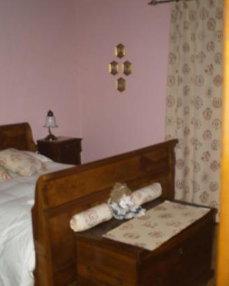 Letto in legno di noce