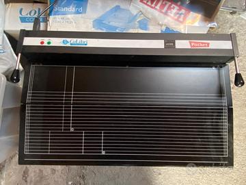 Macchina per ricoprire libri  marchio Colibrì