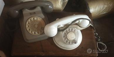 Telefoni fissi vintage a disco SIP (anni '60-'70).