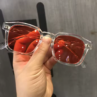 Occhiali unisex trasparente e rosso