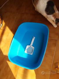 Lettiera toilette blu con paletta