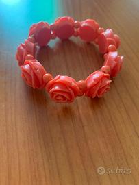 Bracciale con rose rosse colore corallo elasticizz