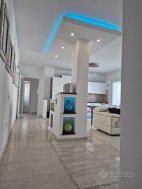 Quadrilocale con vista panoramica e posto auto