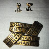 Spilla e orecchini Chanel