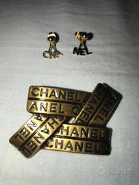 Spilla e orecchini Chanel