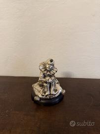 Pierrot in argento 800 su base firmato