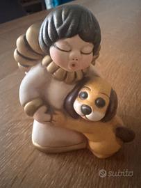 Angelo con cucciolo Thun