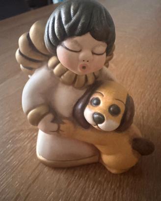 Angelo con cucciolo Thun