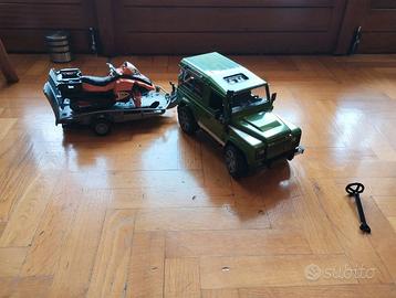 Bruder Jeep defender con slitta