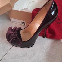 Scarpe suola rossa Louboutin