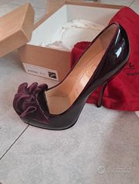Scarpe suola rossa Louboutin