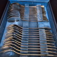 Set posate AMC in acciaio.