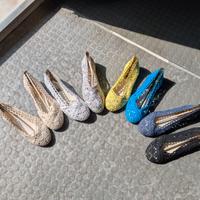 Stock di scarpe da uomo e donna