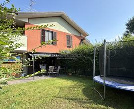 Villa a schiera con giardino privato