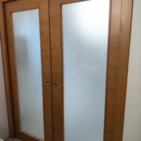 Porta scorrevole con vetro