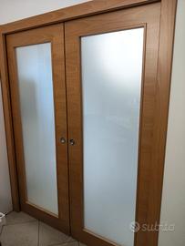 Porta scorrevole con vetro