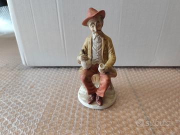 Statuina Capodimonte vecchio bevitore