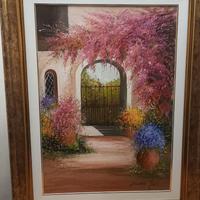 CANCELLO TRA I RAMPICANTI IN FIORE