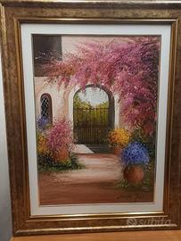 CANCELLO TRA I RAMPICANTI IN FIORE