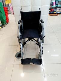 Carrozzina pieghevole