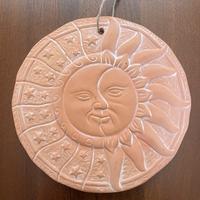 Sole-luna in terracotta artigianale