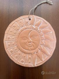 Sole-luna in terracotta artigianale