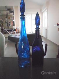 Coppia di bottiglie in vetro da collezione