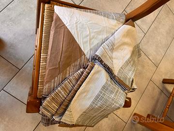 Completo copripiumone