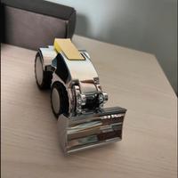 Ferma carte a forma di ruspa