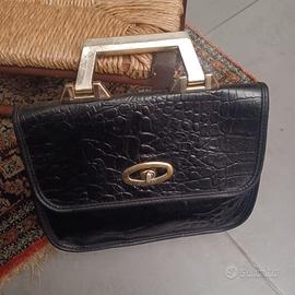 Borsa da donna a mano in pelle goffrata nera