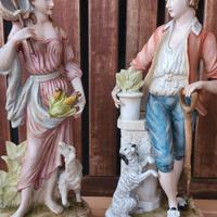 Coppia di statuette in porcellana di Capodimonte "