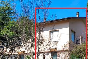 Appartamento con giardino privato