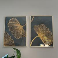 Set di 2 cornici metalliche d'oro con poster