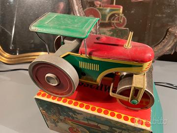 Schiacciasassi giocattolo latta Strassen Waltze