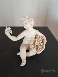 Capodimonte - putto in ceramica lucida