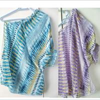 Eleganti top monospalla con spacco laterale