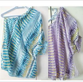 Eleganti top monospalla con spacco laterale